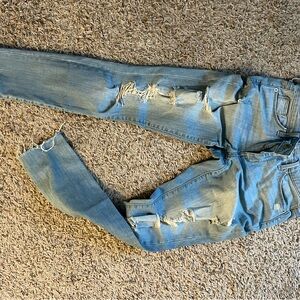 Distressed Light Blue Jeans